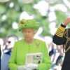La reine Elizabeth II, le prince Charles et Camilla Parker Bowles, duchesse de Cornouailles, lors de la cérémonie de commémoration du 70e anniversaire du débarquement sur les plages de Normandie lors de la Seconde Guerre mondiale, au cimetière de Bayeux le 6 juin 2014