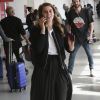 Exclusif - La princesse Beatrice d'York à l'aéroport LAX de Los Angeles le 18 novembre 2018, portant une jupe Misha Nonoo. Un modèle que Meghan Markle portait deux mois plus tôt.