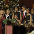 Barack Obama, Michelle Obama et Sasha et Malia, en compagnie de Mariah Carey, Ellen DeGeneres et Maxwell au Building Museum de Washington, le 12 décembre 2010