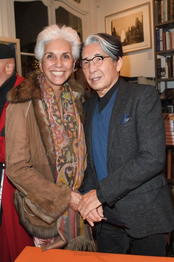 Linda Pinto et Kenzo Takada à la séance de dédicaces du livre de Mme Kazuko Masui "Kenzo Takada" à la librairie Artcurial à Paris, le 21 novembre 2018. © Guirec Coadic/Bestimage