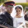 Le prince Harry, duc de Sussex, et Meghan Markle, duchesse de Sussex, en calèche à la sortie du château de Windsor après leur mariage le 19 mai 2018