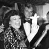 Johnny Hallyday, Régine et son mari Roger Choukroun lors d'une soirée à Paris en 1978.
