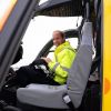 Le prince William, duc de Cambridge, lors de son premier jour en tant que pilote d'hélicoptère-ambulance au sein de l'organisme caritatif East Anglian Air Ambulance (EAAA) à l'aéroport de Cambridge, le 13 juillet 2015.