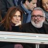 Dominique Farrugia et sa femme Isabelle - Huitième de finale retour entre le Paris Saint-Germain et le Bayer Leverkusen au Parc des Princes remporté par les parisiens sur le score de 2-1 à Paris le 12 mars 2014.