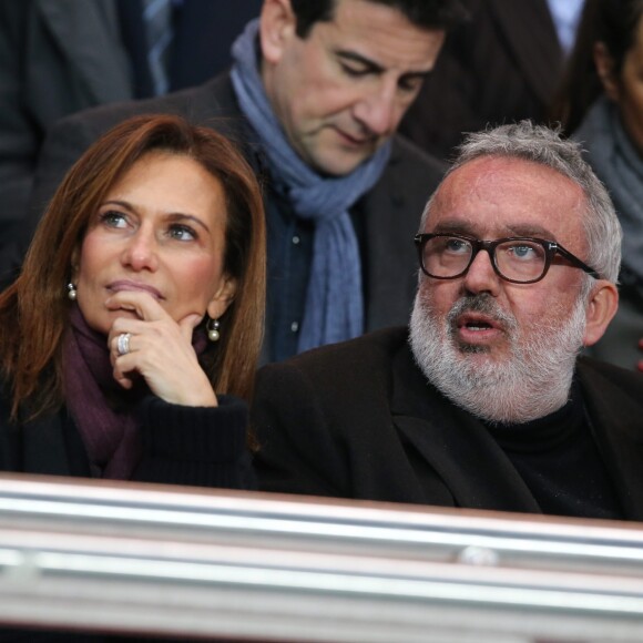 Dominique Farrugia et sa femme Isabelle - Huitième de finale retour entre le Paris Saint-Germain et le Bayer Leverkusen au Parc des Princes remporté par les parisiens sur le score de 2-1 à Paris le 12 mars 2014.