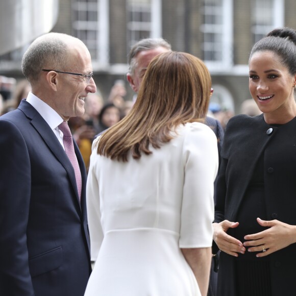 Meghan Markle, enceinte, arrive à l'université de Londres pour rencontrer des membres de l'association des universités du Commonwealth (ACU) le 31 janvier 2019.