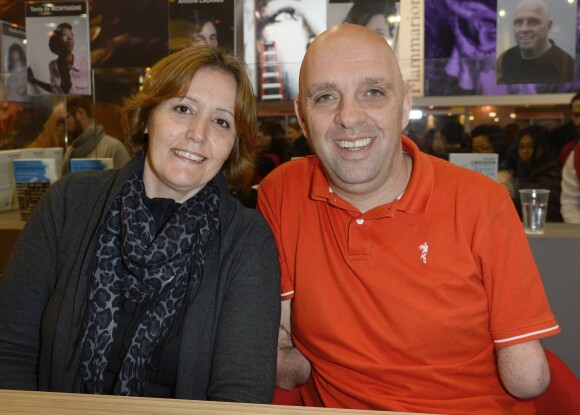 Philippe Croizon et sa femme - 34ème édition du salon du livre à la Porte de Versailles à Paris le 23 mars 2014.
