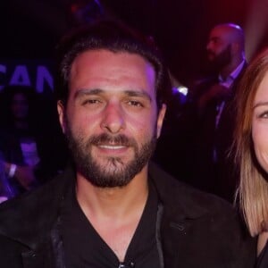 Maxim Nucci (Yodelice) et Isabelle Ithurburu, alors enceinte de leur fille Mia, en juin 2018 au Palais des Sports de Paris lors d'un match de boxe de Tony Yoka. © Veeren-CVS/Bestimage