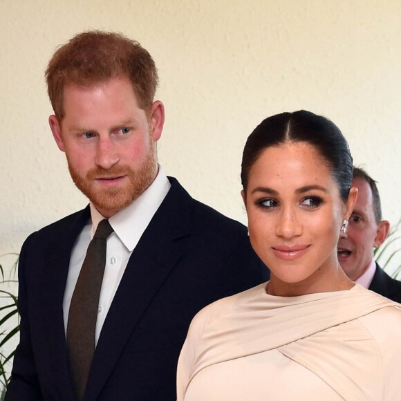 Le prince Harry, duc de Sussex, et Meghan Markle, duchesse de Sussex, enceinte assistent à une réception organisée par l'ambassadeur britannique au Maroc, à la résidence britannique de Rabat, le 24 février 2019.