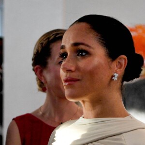 Le prince Harry, duc de Sussex, et Meghan Markle, duchesse de Sussex, enceinte assistent à une réception organisée par l'ambassadeur britannique au Maroc, à la résidence britannique de Rabat, le 24 février 2019.