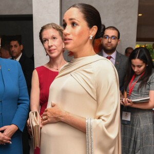 Le prince Harry, duc de Sussex, et Meghan Markle, duchesse de Sussex, enceinte assistent à une réception organisée par l'ambassadeur britannique au Maroc, à la résidence britannique de Rabat, le 24 février 2019.