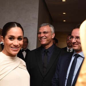 Le prince Harry, duc de Sussex, et Meghan Markle, duchesse de Sussex, enceinte assistent à une réception organisée par l'ambassadeur britannique au Maroc, à la résidence britannique de Rabat, le 24 février 2019.