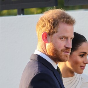 Le prince Harry, duc de Sussex, et Meghan Markle, duchesse de Sussex, enceinte assistent à une réception organisée par l'ambassadeur britannique au Maroc, à la résidence britannique de Rabat, le 24 février 2019.