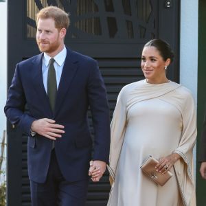 Le prince Harry, duc de Sussex, et Meghan Markle, duchesse de Sussex, enceinte assistent à une réception organisée par l'ambassadeur britannique au Maroc, à la résidence britannique de Rabat, le 24 février 2019.