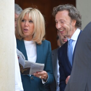 Stéphane Bern, chargé de mission pour le patrimoine, et la première dame Brigitte Macron - Lancement du Loto "Mission Patrimoine" au palais de l'Elysée à Paris, le 31 mai 2018. © Giancarlo Gorassini/Bestimage