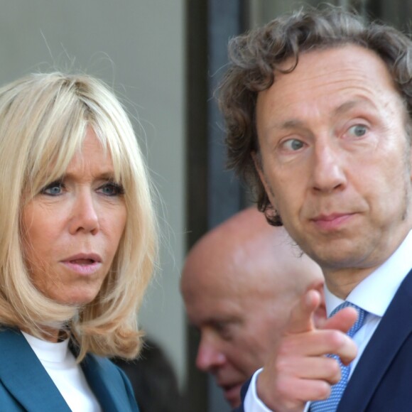 Stéphane Bern, chargé de mission pour le patrimoine, et la première dame Brigitte Macron - Lancement du Loto "Mission Patrimoine" au palais de l'Elysée à Paris, le 31 mai 2018. © Giancarlo Gorassini/Bestimage