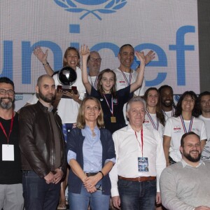 Jacques Monclar, Richard Dacoury, Jean-Philippe Doux, Sydney Govou, Estelle Denis, Camille Lacourt, Yoann Riou, Philippe Saint-André et guest lors du Challenge Swimming Heroes pour l'UNICEF lors du meeting Olympique à la piscine de Courbevoie, France, le 24 février 2019. © Pierre Perusseau/Bestimage