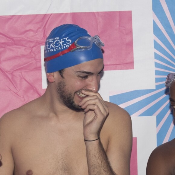 Estelle Denis, guest et Sydney Govou lors du Challenges Swimming Heroes pour l'UNICEF lors du meeting Olympique à la piscine de Courbevoie, France, le 24 février 2019. © Pierre Perusseau/Bestimage