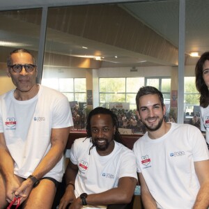 Jacques Monclar, Richard Dacoury, Sidney Govou, guest et Estelle Denis lors du Challenges Swimming Heroes pour l'UNICEF lors du meeting Olympique à la piscine de Courbevoie, France, le 24 février 2019. © Pierre Perusseau/Bestimage
