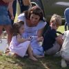 Kate Middleton, duchesse de Cambridge avec ses enfants le prince George et la princesse Charlotte lors d'un match de polo caritatif au Beaufort Polo Club à Tetbury le 10 juin 2018.