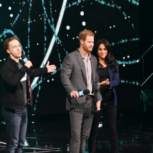 Le prince Harry, duc de Sussex, et Meghan Markle, duchesse de Sussex, enceinte, lors de l'évènement WE Day au Wembley Arena à Londres, Royaume Uni, le 6 mars 2019.