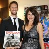 Romain Grosjean et son épouse Marion Jollès-Grosjean (enceinte) posent pour la promotion de leur livre de recettes de cuisine "Cuisine et Confidences", disponible en anglais.