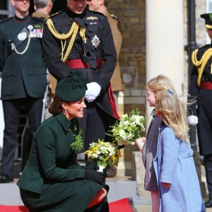 Le prince William, duc de Cambridge et Kate Middleton lors de la parade de la Saint Patrick dans le quartier de Hounslow à Londres le 17 mars 2019.