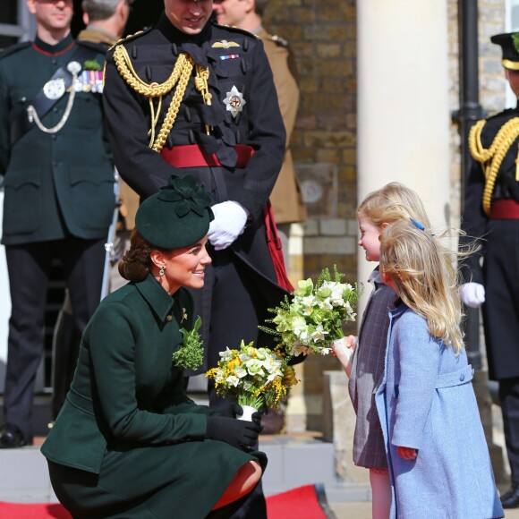 Le prince William, duc de Cambridge et Kate Middleton lors de la parade de la Saint Patrick dans le quartier de Hounslow à Londres le 17 mars 2019.