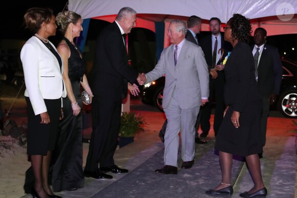 Le prince Charles, prince de Galles, arrive à la réception du gouverneur général avec le Premier ministre de Sainte-Lucie, Michael Chastanet et sa femme Raquel Chastanet, à l'hôtel Serenity, Coconut Bay, à Sainte-Lucie, le 17 mars 2019, lors de sa tournée de 13 jours dans les Caraïbes.
