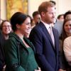 Le prince Harry, duc de Sussex, Meghan Markle, enceinte, duchesse de Sussex, lors de leur visite à Canada House dans le cadre d'une cérémonie pour la Journée du Commonwealth à Londres le 11 mars 2019.
