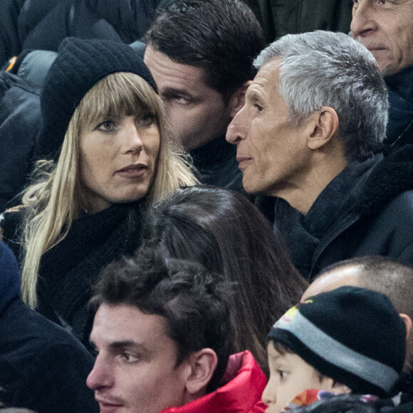 Nagui et sa femme Mélanie Page - People assistent au match des éliminatoires de l'Euro 2020 entre la France et l'Islande au Stade de France à Saint-Denis le 25 mars 2019. La france a remporté le match sur le score de 4-0.