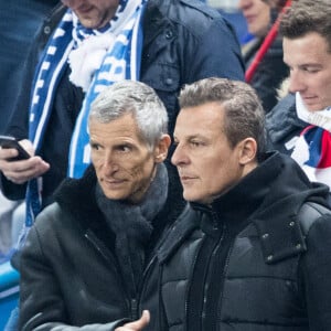 Nagui et Jean-Roch - People assistent au match des éliminatoires de l'Euro 2020 entre la France et l'Islande au Stade de France à Saint-Denis le 25 mars 2019. La france a remporté le match sur le score de 4-0.