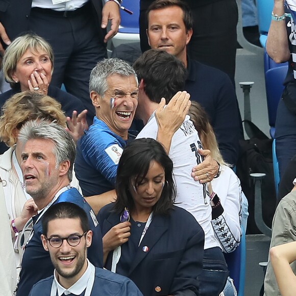 Nagui et Dylan Deschamps dans les tribunes lors du match de quart de finale de la Coupe du Monde Russia2018 "France - Uruguay (FIFA World Cup Russia2018)" au stade Nijni Novgorod. La France a gagné 2-0 et rencontrera la Belgique en demi-finale. Russie, le 6 juillet 2018. © Cyril Moreau/Bestimage