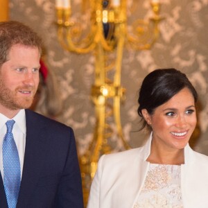 Le prince Harry, duc de Sussex, et Meghan Markle (enceinte), duchesse de Sussex - La famille royale d'Angleterre lors de la réception pour les 50 ans de l'investiture du prince de Galles au palais Buckingham à Londres. Le 5 mars 2019