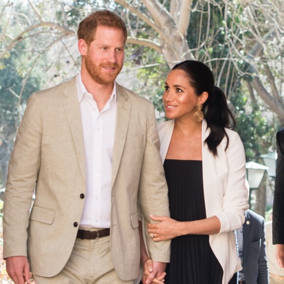 Le prince Harry, duc de Sussex et Meghan Markle, duchesse de Sussex, enceinte, en visite au "Andalusian Gardens" à Rabat lors de leur voyage officiel au Maroc, le 25 février 2019.