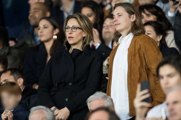Maud Fontenoy avec son fils Mahe et Pierre Sarkozy - Célébrités dans les tribunes du parc des princes lors du match de football de ligue 1, Paris Saint-Germain (PSG) contre Strasbourg à Paris le 7 avril 2019. Le match s'est soldé par un match nul 2-2.