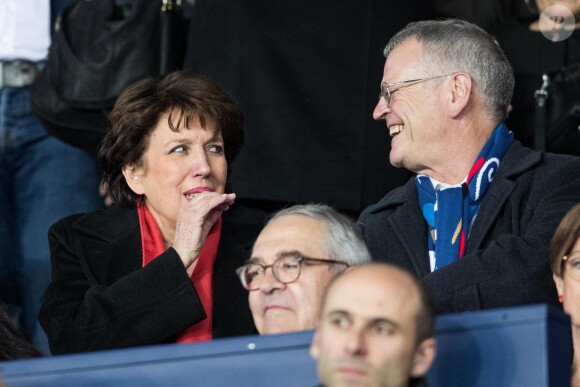 Roselyne Bachelot et un ami Pascal Boniface - Célébrités dans les tribunes du parc des princes lors du match de football de ligue 1, Paris Saint-Germain (PSG) contre Strasbourg à Paris le 7 avril 2019. Le match s'est soldé par un match nul 2-2.