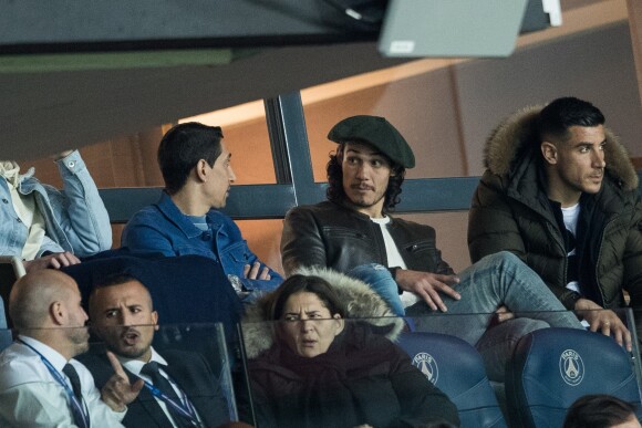 Angel Di María , Edinson Cavani - Célébrités dans les tribunes du parc des princes lors du match de football de ligue 1, Paris Saint-Germain (PSG) contre Strasbourg à Paris le 7 avril 2019. Le match s'est soldé par un match nul 2-2.