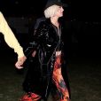 Exclusif - Orlando Bloom et sa fiancée Katy Perry se pressent pour arriver à l'heure au concert de Childhish Gambino pendant le festival Coachella, Indio, le 12 avril 2019.