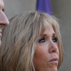 Le président Emmanuel Macron, la première dame Brigitte Macron - Le président de la République française et sa femme accueillent le roi et la reine de Jordanie au palais de l'Elysée à Paris le 29 mars 2019. © Stéphane Lemouton / Bestimage