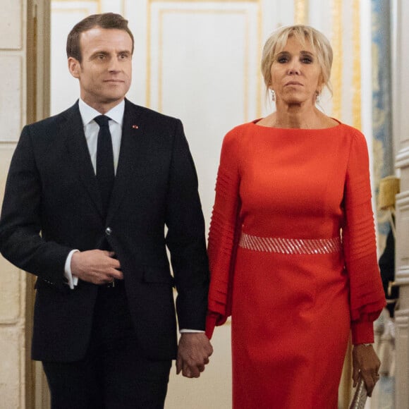 Le président de la République française Emmanuel Macron et sa femme la Première Dame Brigitte Macron lors du dîner d'Etat au palais de l'Elysée à Paris, France, le 25 mars 2019. © Lewis Joly/Pool/Bestimage