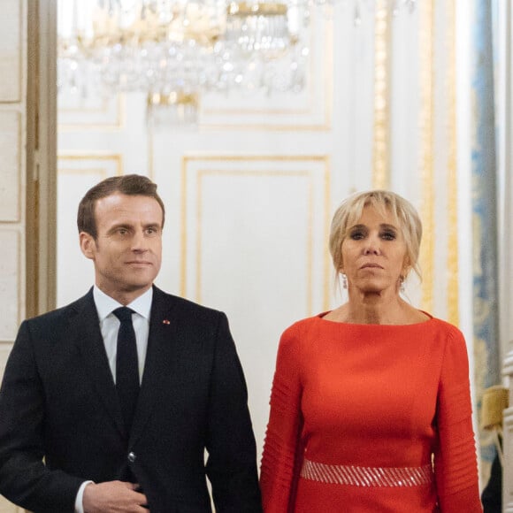 Le président de la République française Emmanuel Macron et sa femme la Première Dame Brigitte Macron lors du dîner d'Etat au palais de l'Elysée à Paris, France, le 25 mars 2019. © Lewis Joly/Pool/Bestimage