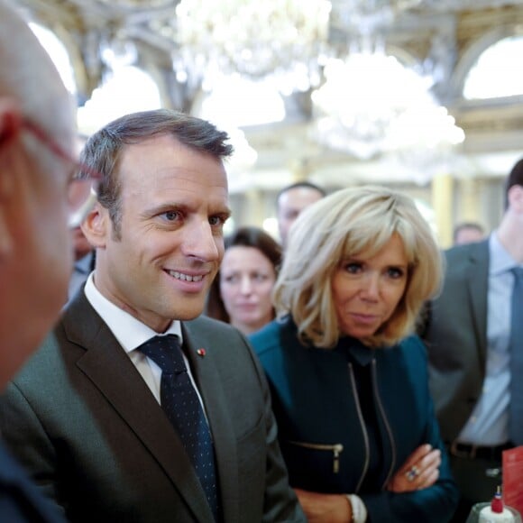 Emmanuel Macron, président de la republique et Brigitte Macron. Le président de la République reçoit les métiers de bouche au palais de l'Elysée à Paris, pour la fête du 1er mai. © Xavier Popy / Pool / Bestimage