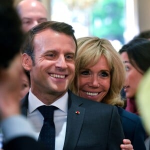 Brigitte Macron et Emmanuel Macron, président de la republique. Le président de la République reçoit les métiers de bouche au palais de l'Elysée à Paris, pour la fête du 1er mai. © Xavier Popy / Pool / Bestimage