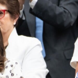 Catherine (Kate) Middleton, duchesse de Cambridge et Meghan Markle, duchesse de Sussex assistent au match de tennis Nadal contre Djokovic lors du tournoi de Wimbledon "The Championships", le 14 juillet 2018.