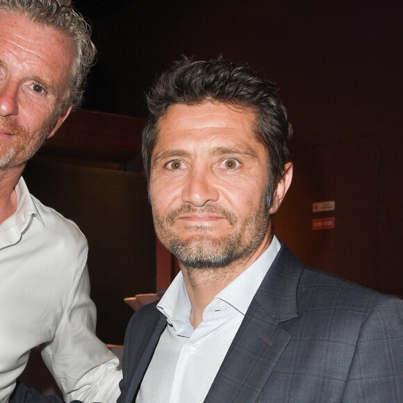 Denis Brogniart et Bixente Lizarazu à la première du documentaire "98 Secrets d'une Victoire" au cinéma Gaumont Champs-Elysées Marignan à Paris, le 30 mai 2018. © Guirec Coadic/Bestimage