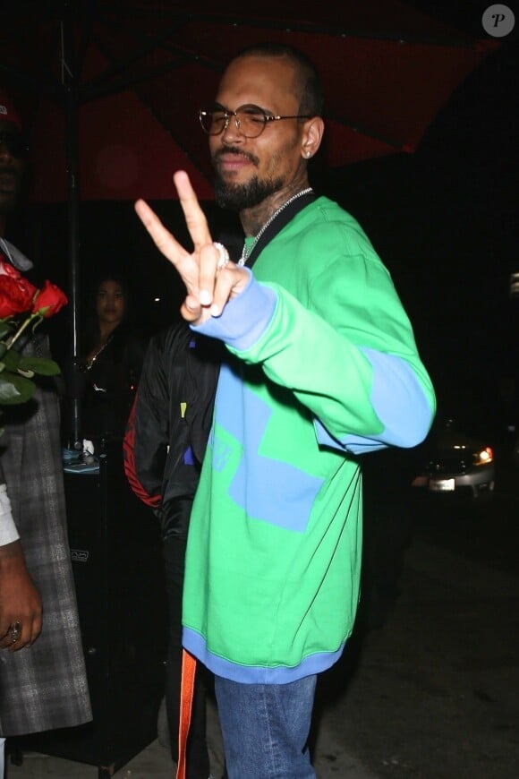 Chris Brown est allé faire la fête avec des amies chez Poppy à West Hollywood, le 5 avril 2018