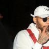 Chris Brown en salopette rouge - People au lancement de la collection boohoo.com au Dream Hollywood à Los Angeles le 21 mars 2018