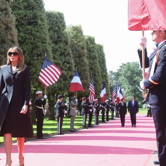 Les premières dames Brigitte Macron et Melania Trump - 75ème anniversaire du débarquement - Cérémonie franco - américaine au cimetière américain de Colleville sur Mer le 6 juin 2019. Défilé aérien franco-américain depuis la table d'orientation d'Omaha Beach, face à la mer. © Stéphane Lemouton / Bestimage