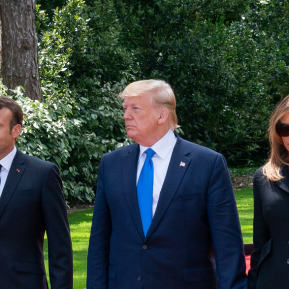Le président français Emmanuel Macron et sa femme Brigitte, le président des Etats-Unis Donald Trump et sa femme Melania - Commémorations au cimetière américain lors du 75ème anniversaire du débarquement en Normandie. Le 6 juin 2019.